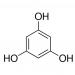A photograph of school stationery including 25g of benzene-1 3 5-triol (phloroglucinol) is shown. The stationery consists of various writing utensils, notebooks, and folders. The bottle of benzene-1 3 5-triol can be seen on a desk alongside the other supplies. The label on the bottle displays the chemical formula and ingredients.