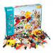 The photograph shows a colorful assortment of school stationery, including pencils, markers, scissors, and glue, arranged neatly in a Brio Builder creative set. The set also includes various paper shapes and textures for endless creative possibilities.