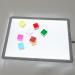 This photo features a sleek A1 White Lightpad surrounded by an array of essential school stationery items. The vibrant white surface of the Lightpad provides the perfect canvas for creative projects and notes.