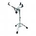 The image shows a silver, adjustable snare drum stand from the 924 series of school stationery. The tripod base supports the drum with sturdy black rods and padded brackets. The stand can be set to various heights and angles for optimal playing comfort.