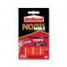 The photo shows a pack of 10 bright red adhesive strips, each measuring 20x40mm, from Henkel Glue Dots No More Nails Permanent Adhesive line. The strips are neatly stacked on top of each other, with the brand name and product name clearly visible on the packaging.