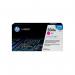 The photograph captures a set of four HP ink cartridges, specifically the magenta color, in their original packaging. The sleek and professional design of the cartridges is displayed, along with the distinctive HP brand logo and CE253A model number.