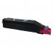 The image shows a stack of Kyocera ink cartridges, specifically the magenta TK-865M model. The packaging features the Kyocera logo and product name, along with the vibrant magenta color of the cartridge. The bottom of the packaging has a label with the product code and other information.