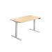 The Jemini Sit Stand and Height Adjustable Desk is a modern piece of office furniture that features sleek lines and a versatile design. Its 1200x800x630-1290mm size allows for ample workspace, while the MapleWhite finish adds a touch of elegance. Equipped with cable ports, this desk offers both functionality and style for any workspace.