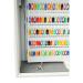 The photograph captures a sturdy key cabinet with the brand name Phoenix prominently displayed on the front. The cabinet has a sleek metallic finish and is equipped with a secure locking mechanism. Inside, there are 500 hooks neatly arranged, ready to hold a large number of keys. The cabinet exudes a professional and organized vibe, making it a practical choice for any business or household.