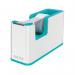This picture features the Leitz WOW Tape Dispenser in a dual colour design of white and ice blue. The elegant and sleek design is complimented by the Leitz branding on the front. The tape dispenser is shown dispensing a strip of tape, highlighting its functionality and ease of use.