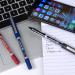 This image shows a set of five Uni-Ball Rollerball Pens, featuring the UB-150 Eye Rollerball Pen in black. The pens have a fine tip, perfect for precise writing. The sleek design of the pen is complemented by its comfortable grip, making it easy to write with for extended periods of time. The ink flows smoothly and dries quickly, leaving no smudges or smears. Each pen is elegantly labeled with the brand logo and pen type, making it easy to identify. This set is a practical and stylish addition to any office, classroom, or home workspace.