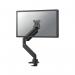 A sleek and modern desk setup featuring a black Neomounts by Newstar monitor arm. The full motion design allows the user to easily adjust their 17-42 inch screen for optimal viewing. Perfect for creating a comfortable and organized workspace.