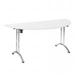 The photograph shows a sleek and modern design, with a semi-circular white tabletop resting on a chrome frame. The table is compact and versatile, folding easily for storage when not in use. The Nautilus Designs logo is visible on the side of the frame.