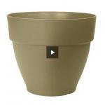 This photograph captures a vibrant Elho Garden Maintenance Elho Vibia Round Campana Pot in a bright green hue. The 30cm size adds a perfect touch of elegance to any indoor or outdoor garden space. Brand new with tags for a fresh and modern look.
