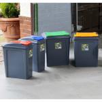 This photo showcases a blue bin with a lid, labeled as Wham Recycle It and 50 Litre. The bin is from the brand What More UK and has the product code NWT7161. The bin base and lid appear to be brand new, still with tags attached. It is a standard size and design for recycling purposes.