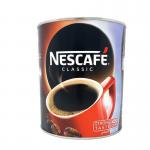 This photo features a 750g jar of Nescafe Instant Coffee CLASSIC Granules. The Nescafe logo is prominently displayed on the front, along with the description Import. The jar is sealed and has a red lid.