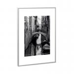 This photo features a sleek and modern brushed aluminium certificate frame from Hampton Frames. The frame is designed to fit standard A1 size documents and displays them beautifully. The Hampton Frames logo is subtly etched into the lower right corner.