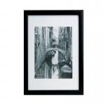The Hampton Frames Wooden Frame in A4 size is coated in sleek black and has a modern, clean look. Its high-quality construction offers sturdiness and durability. Perfect for displaying your favorite pictures, this frame will complement any home decor.