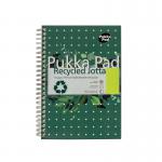 This image shows three Pukka Eco A5 notebooks. The notebooks have a wirebound recycled ruled design with 110 pages each. They are A5 in size and feature the Pukka Pad logo on the cover. The notebooks are stacked neatly on top of each other, with the top notebook flipped open to reveal its lined pages. The notebooks have a green and beige color scheme, giving them an environmentally-friendly feel.
