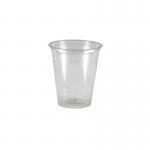 In this picture, there are a large quantity of durable, clear 7oz plastic cups stacked neatly in rows. Each cup is unbranded with a simple design and ready to serve your guests at any event or gathering.