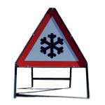 The image features a red and white Spectrum Industrial snow and ice warning sign, measuring 600mm. The sign clearly displays the words Winter Hazard Snow and Ice and serves as a warning for potential dangers on the road or pathway during snowy and icy conditions.
