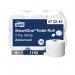 The picture shows a pack of 6 Tork Jumbo Toilet Rolls. Each roll is 2-ply, white, and contains 1150 sheets. The packaging is labeled with the Tork SmartOne logo. The rolls are neatly stacked on top of each other, ready for use in any bathroom setting. The high sheet count means this pack will last for an extended period of time.