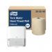 The photo shows 6 rolls of natural Tork Hand Towel Rolls, accompanied by a Tork Matic dispenser. The rolls are neatly stacked, with a label indicating the brand and type. The dispenser is also visible, with a sleek design and clear labeling. Overall, the photo showcases the high quality and practicality of Tork hand towel products.