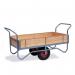 This photo shows two Slingsby Warehouse Trolleys with balanced weight distribution and short sides and handles at both ends. The trolleys are ideal for general purpose use and are designed to be versatile and easy to maneuver.