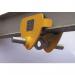 The photo features several slingsby lifting equipment push travel trolleys with a weight capacity of 2000kg. The trolleys are lined up side by side and have a sleek, silver design. Each trolley has four wheels and a long handle for easy transport.