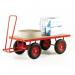 The image shows two Slingsby platform trucks with MDF platforms, mounted on pneumatic tyres. The trucks have a capacity of 1000kg and feature a turntable design for easy maneuverability. The trucks are ideal for various transportation and heavy lifting tasks.