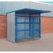 This picture features a series of slingsby drum containers and accessories inside a gated shelter. The containers are neatly arranged and secured, while the shelter provides protection from the elements.