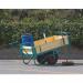 This picture features Slingsby Warehouse Trolleys, designed for general purpose use. These trucks have double handles and closed sides, providing balanced and secure transportation for various items.