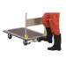 The image shows a set of foot brake kits designed for Slingsby Warehouse Trolleys. The kits are made of durable materials and feature a sleek design. The brakes can easily be attached to the trolleys wheels to securely hold it in place when in use. The kits are compact and easy to install, making them a practical addition to any warehouse trolley.