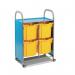 The picture shows a tall, narrow cupboard with several shallow trays stacked neatly inside. On the side of the cupboard are multiple mobile tray storage trolleys, each filled with additional trays. The trays are organized and ready for storage or transportation.