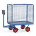 A photograph of Slingsby Warehouse Trolleys Trailers for hand powered towing would show a sturdy, industrial-looking cart with turntable wheels. The cart has 1000mm high sides and ends, providing ample storage space for hauling items. The design is sleek and practical, perfect for navigating warehouse aisles and transporting heavy loads.