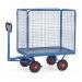 In the photo, multiple Slingsby Warehouse Trolleys Trailers can be seen lined up, ready for hand powered towing. The turntable trucks feature 1000mm high sides and ends, providing ample space for transporting goods. The sleek design and durable construction are evident in the image, making these trolleys and trailers ideal for use in warehouse settings.