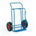 In the photograph, several sturdy slingsby warehouse trolleys and welders trolleys are on display. These reliable and versatile trolleys feature strong construction and are perfect for heavy-duty use in any warehouse setting.