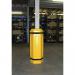 In the photograph, the Slingsby parking facilitys slimline column protector can be seen. It is designed to fit inner diameters of up to 100mm. The protector is a cylindrical shape with a smooth, sleek surface. The coloring is neutral with no apparent branding or logos visible. It is positioned next to a parking column, providing a protective barrier. The protector appears durable and secure, ready to withstand potential impacts and protect the column.