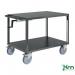 The photograph shows several sturdy steel shelf trolleys from Kongamek. These trolleys feature adjustable heights, making them versatile and efficient for various tasks. The shelves are neatly organized and ready to store or transport items.