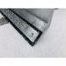 A photograph of a Slingsby Snow and Ice Fork mounted snow plough shows a sturdy snow plough with a rubber blade insert. The plough is designed to clear snow and ice efficiently, with a durable construction that can withstand harsh winter conditions. The rubber blade insert allows for precision and effectiveness in snow removal. The plough is mounted onto a forklift, making it a convenient and versatile tool for clearing snow from various surfaces. The crisp white snow contrasts against the black and orange colors of the plough, capturing the eye and showcasing its functionality.
