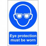 This image shows a sign from Spectrum Industrial for personal protective equipment (PPE) that reminds workers to wear eye protection. It is made of 1.2mm thick recyclable polypropylene and measures 200 x 300mm. The background is white with bold black text and an image of an eye wearing protective glasses. The sign is rectangular in shape and has rounded corners.