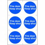 This picture shows a Spectrum Industrial fire safety sign: Fire Door Keep Shut. It is made of 1.2mm recyclable PP material and measures 200 x 300mm. The background is red with white text and a pictogram of a fire door. The edges are smooth and the sign appears sturdy.