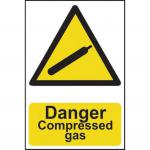The image shows a collection of industrial danger signs, specifically one that warns of compressed gas. The sign is made of 1.2mm thick recyclable PP material and measures 200 x 300mm. It features the words Danger - Compressed Gas in bold letters, with a bright yellow background and black border for high visibility and easy reading. The sign is designed to ensure the safety of all those who come into contact with it in an industrial setting.