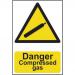 The image shows a collection of industrial danger signs, specifically one that warns of compressed gas. The sign is made of 1.2mm thick recyclable PP material and measures 200 x 300mm. It features the words Danger - Compressed Gas in bold letters, with a bright yellow background and black border for high visibility and easy reading. The sign is designed to ensure the safety of all those who come into contact with it in an industrial setting.