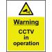 The photograph shows a yellow and black sign that reads Warning CCTV in Operation with a symbol of a camera in the center. The sign is made from 1.2mm recyclable PP and measures 300 x 400mm. It is designed for industrial use and is suitable for outdoor environments.