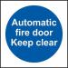 The photo shows a Spectrum Industrial Fire Safety Sign for an automatic fire door. Made from 1.2mm recyclable PP material, the sign reads Keep Clear in bold letters. It is 100 x 100mm in size and has the product number 11337 printed on the side.