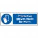 The image shows a bright yellow sign with bold black lettering that reads Protective gloves must be worn 1.2mm Recyclable PP. The sign is made of durable material and measures 600 x 200mm. The background features the Spectrum Industrial logo and the word Spectrum in blue, while the word Industrial is in red. The sign serves as a reminder to wear protective gloves in a workplace setting.