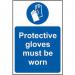 In this photo, a bright yellow self-adhesive vinyl sign can be seen with the message Protective Gloves Must Be Worn written in bold black font. The sign is designed by Spectrum Industrial and measures 200mm x 300mm. It features an image of a pair of protective gloves in the center, making it clear that gloves are required for safety purposes. This sign is ideal for any industrial setting that requires the use of personal protective equipment.