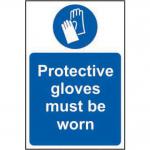 The picture shows a bright yellow sign with bold, black text that reads Protective Gloves Must Be Worn in capital letters. The sign is made of self-adhesive vinyl and measures 400mm x 600mm. In the center, there is an image of a pair of industrial gloves. The background features a red and white striped pattern. Overall, the sign has a professional and eye-catching design.