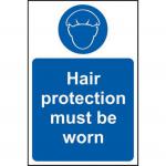 The image shows a Spectrum Industrial PPE sign for hair protection. The sign is made of 1.2mm recyclable PP and measures 200 x 300mm. The sign features a bold, colorful design with the words Hair protection must be worn in large letters. The background is a bright yellow color, with black and red outlines on the text. The sign is suitable for industrial settings and is an important safety reminder.