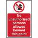 The photograph captures a large, rectangular sign with bold red and black lettering that reads Spectrum Industrial Prohibited Signs. The main message No unauthorized persons allowed beyond this point is emphasized in the center. The sign is made of sturdy 1.2mm recyclable polypropylene and measures 400 x 600mm.