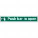 The picture shows a bright Spectrum Industrial Fire Safety Sign with a directive to Push the bar to open. Made of 1.2mm recyclable PP material, the sign measures 600 x 100mm and features number 12141. The sign is designed to be eye-catching and informative for fire safety protocols.
