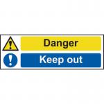 The picture shows a brightly-colored Spectrum Industrial Danger Sign with the words Danger Keep Out printed in bold font. The sign is made of sturdy 1.2mm recyclable PP material and measures 600 x 200mm. The background has a diagonal striped pattern in red and white, while the text and illustrations are in black and yellow. The sign has rounded corners and four pre-drilled holes for easy installation.