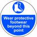A round industrial floor graphic with a bright yellow background and bold black lettering. The graphic features the words Wear Protective Footwear Beyond This Point in the center, surrounded by a white and red striped border. The entire graphic is laminated for durability and features anti-slip properties to ensure safety. Perfect for any industrial setting.